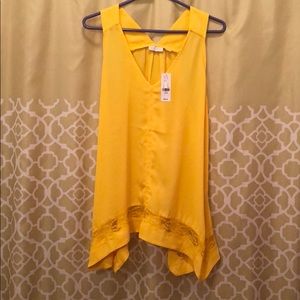 STUNNING golden yellow top. Super flattering.